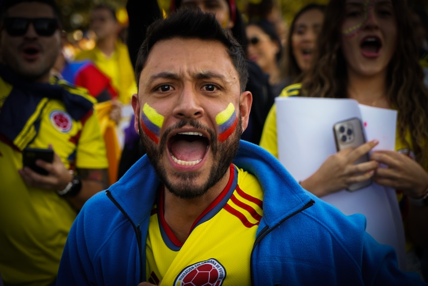Excited Colombian fan at the soccer 