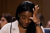 Simone Biles appears emotional while testifying at the US Congress