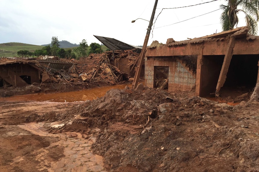 Piles of rubble buried in mud