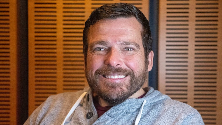 Head and shoulders photo of a smiling Kurt Fearnley.