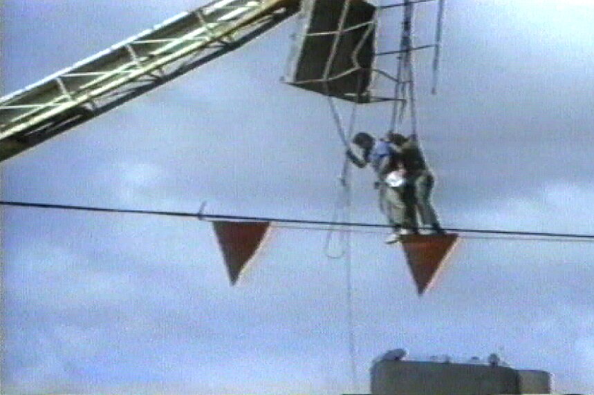 Injured workers at Adelaide Oval hanging by their harnesses