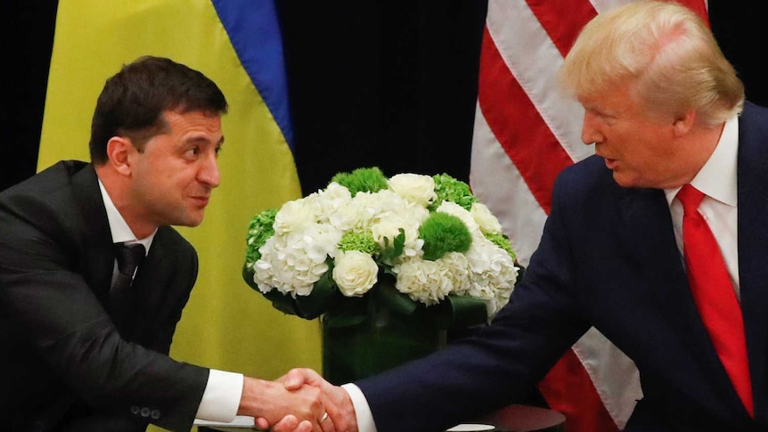 Ukraine's President Volodymyr Zelenskiy listens to U.S. President Donald Trump speak during a bilateral meeting