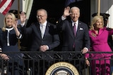 Jodie Haydon, Anthony Albanese, Joe Biden and Jill Biden wave from the White House balcony.