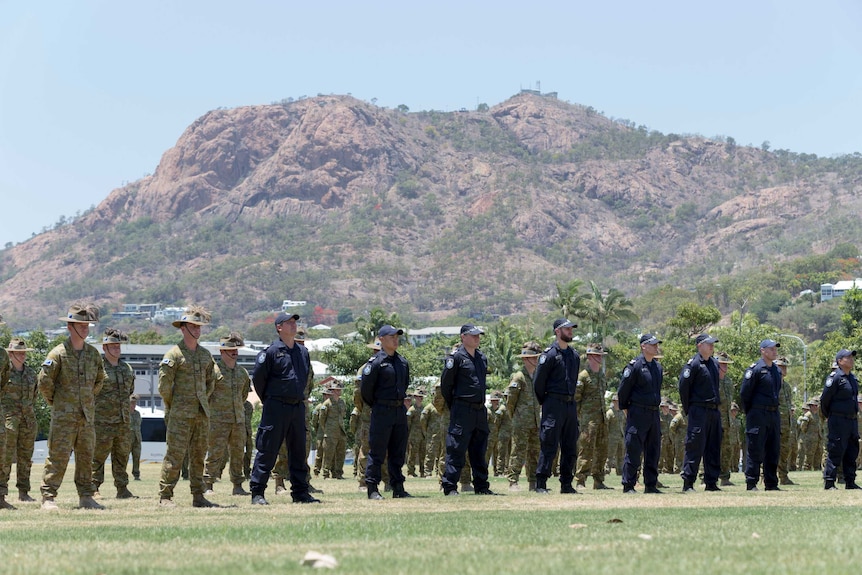 Parade in front of hill