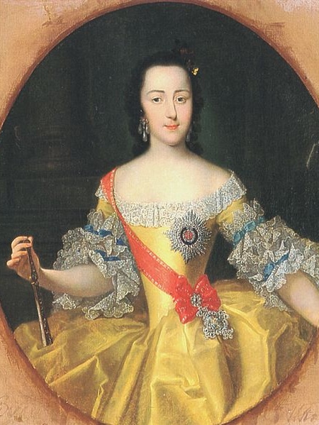 A portrait of a young Empress Catherine II of Russia wearing an elaborate yellow dress