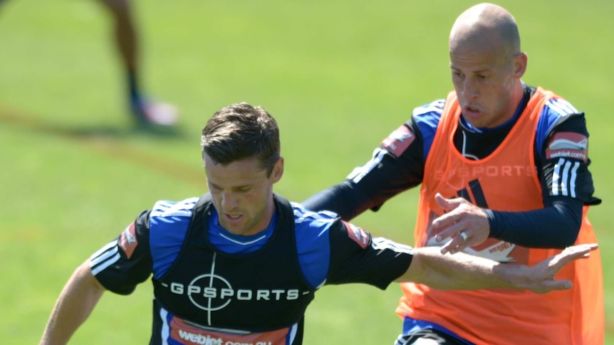 Jason Culina (L) has had his Sydney FC contract terminated after a spat with coach Frank Farina.