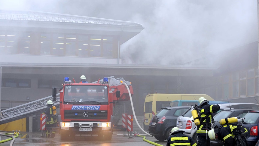 Firefighters at the scene of a fire in Titisee-Neustadt.