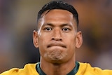 Israel Folau looking straight ahead during the rematch ceremony ahead of a Australia vs Ireland Test.