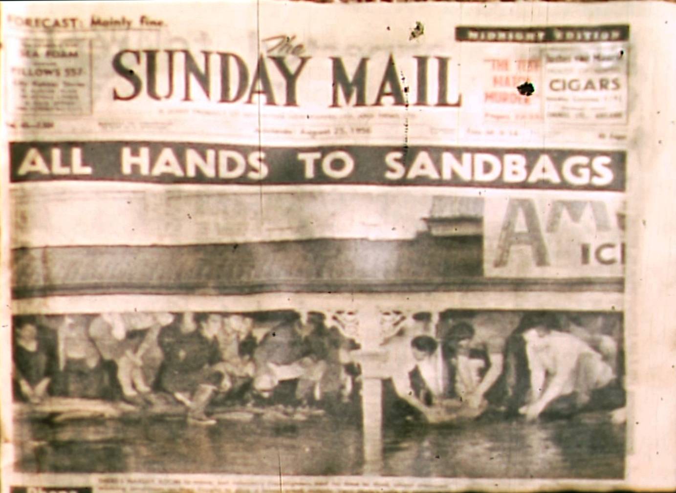 a snapshot of a newspaper front page from 1956