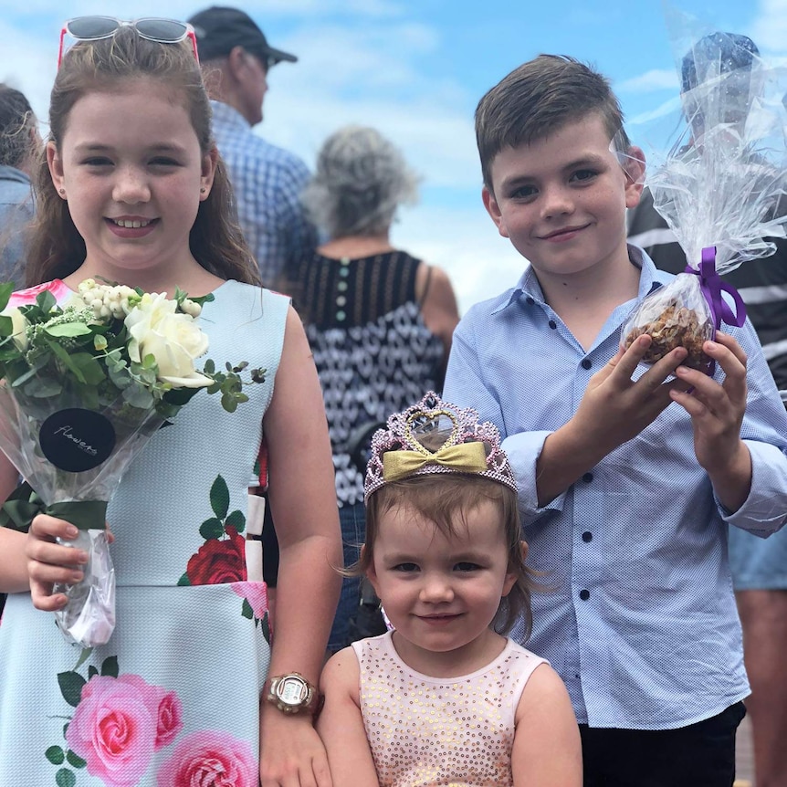 Three children dressed up at Broadbeach