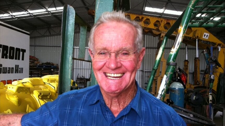 John Ward, from Swan Hill, is flat out fixing damaged header fronts