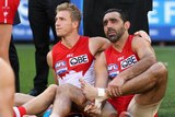 Sydney's Adam Goodes (R) and Kieran Jack reflect on a grand final loss to Hawthorn.