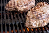 A steak on a barbecue grill