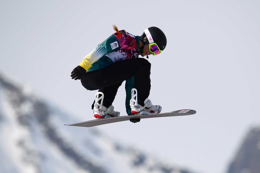 Torah Bright competes in the snowboard cross