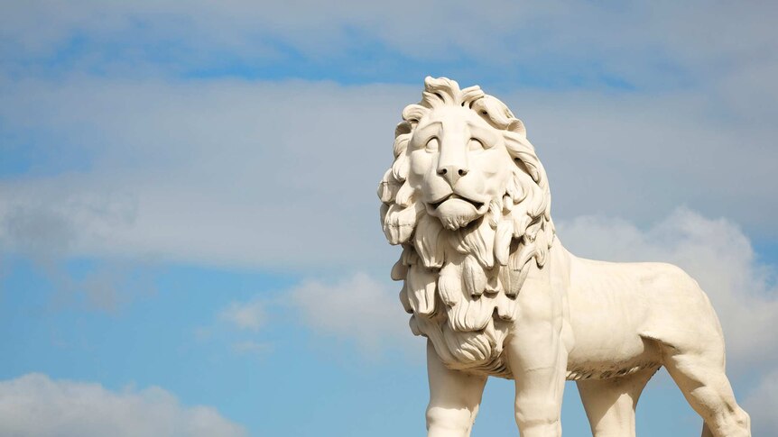 White Coade Stone Lion Statue Stands in London Sky