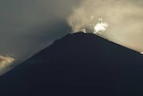 Mount Agung volcano venting steam vapour ahead of a likely eruption.