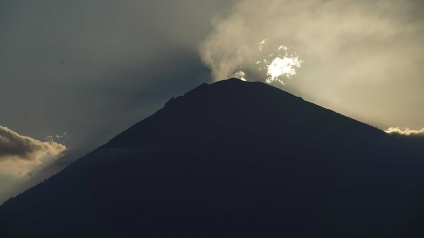 Mount Agung volcano venting steam vapour ahead of a likely eruption.