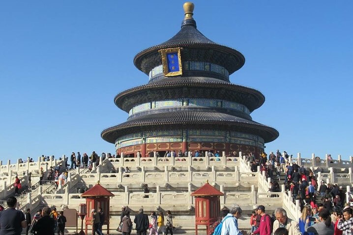 Tourists underneath the Temple of Heaven in Beijing