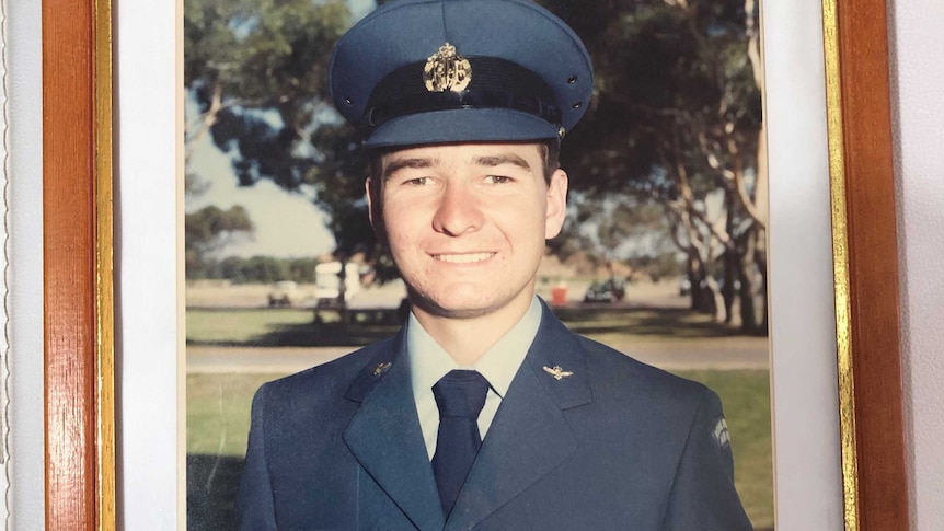 A framed photograph of a young Brian Hunt in his RAAF uniform