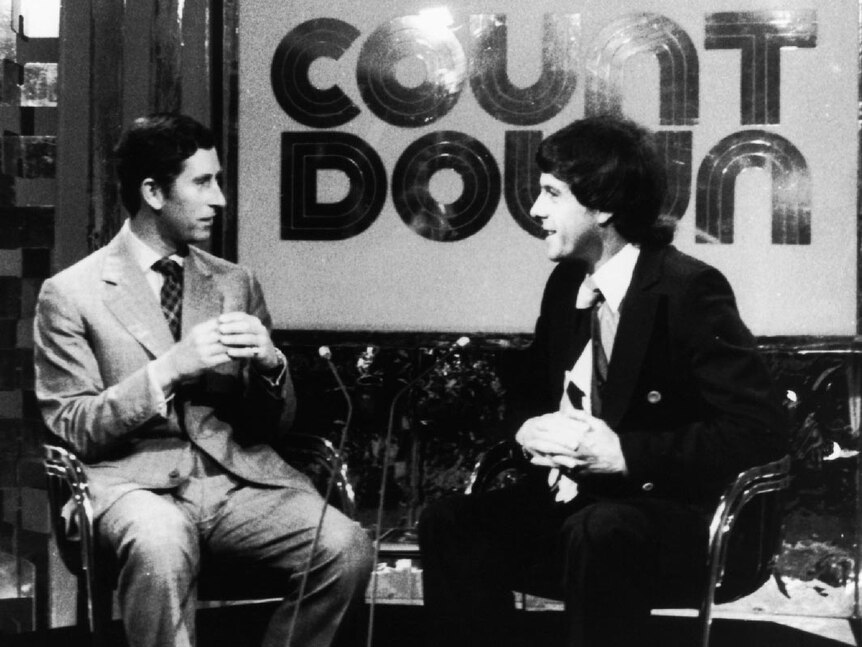 Molly Meldrum speaks with Prince Charles on the set of Countdown.