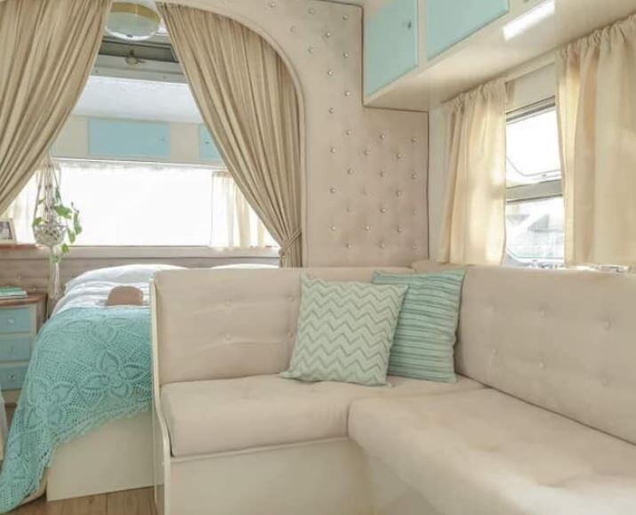 Jeanie's interior features padded walls, pressed metal ceilings and a cream and aqua colour scheme.