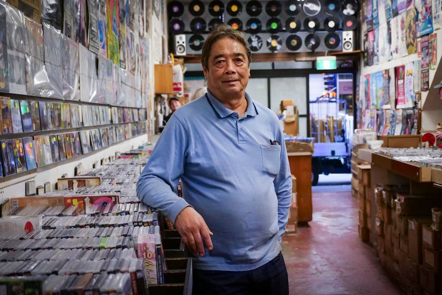Jerry Pasqual standing in his Pitt Street store, Lawson's Records.