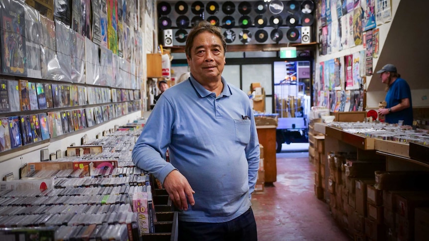 Jerry Pasqual standing in his Pitt Street store, Lawson's Records.