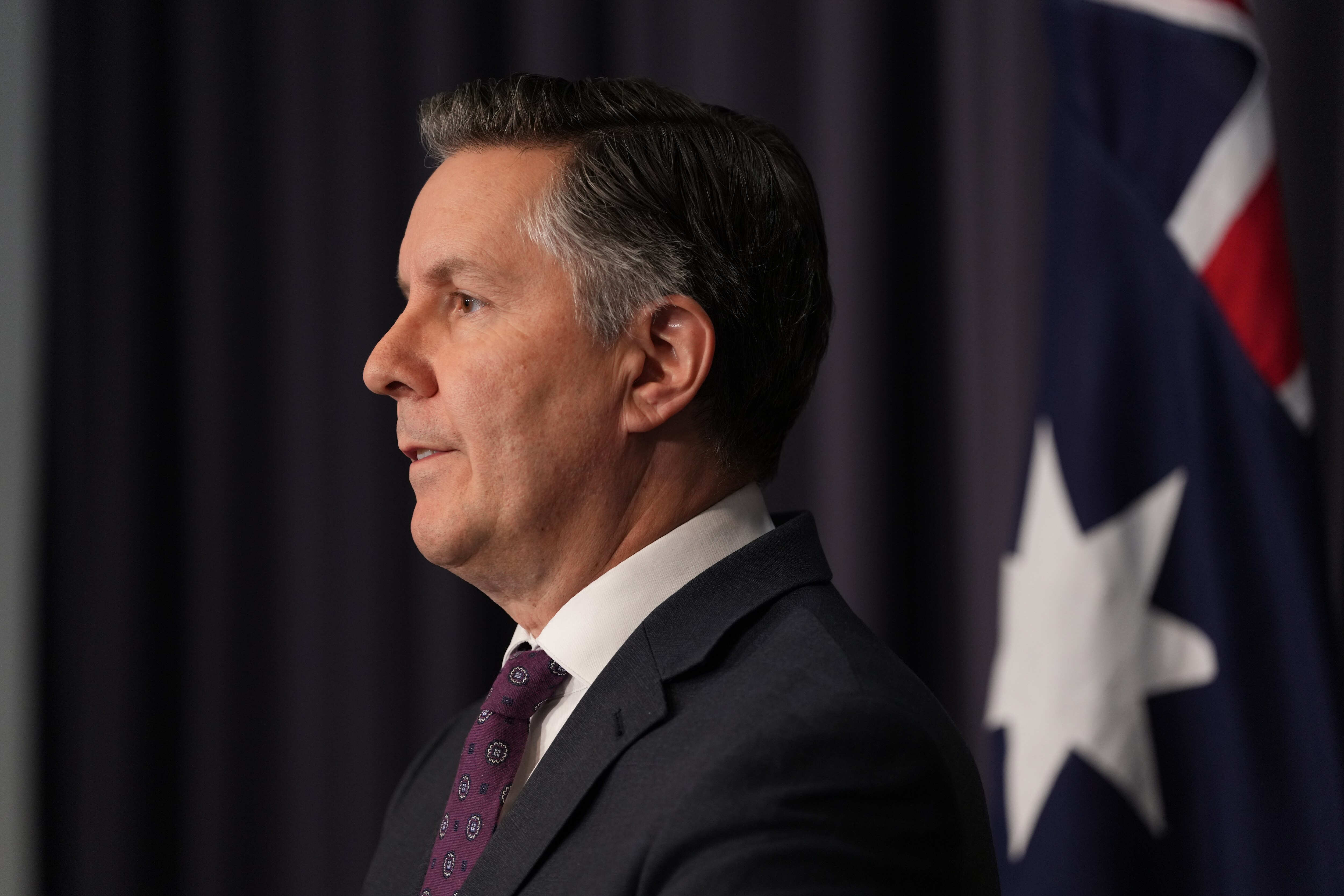 Close up, side shot of Mark Butler. 