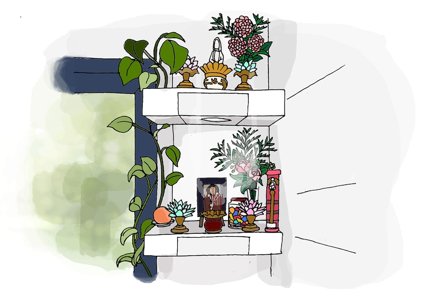 An illustration shows two white shelves stacked with plants, incense, framed photos and jars of sweets