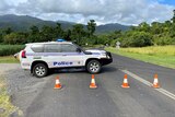 A police car blocks the road to Babinda Boulders