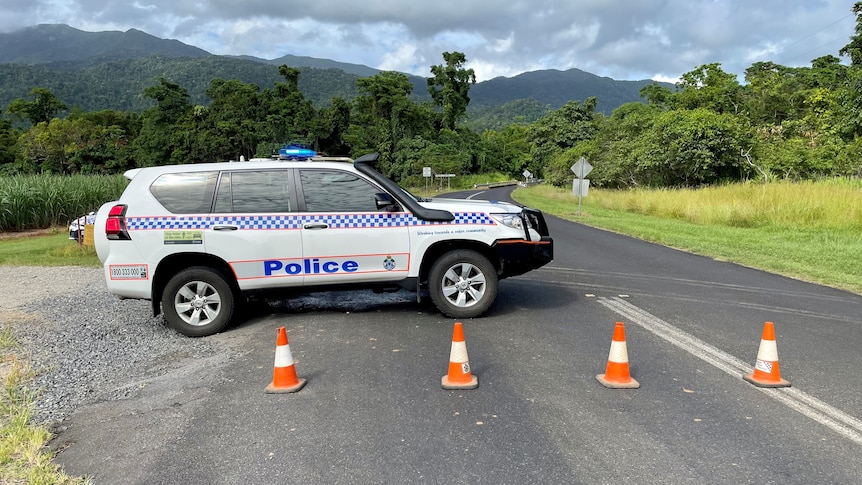 A police car blocks the road to Babinda Boulders