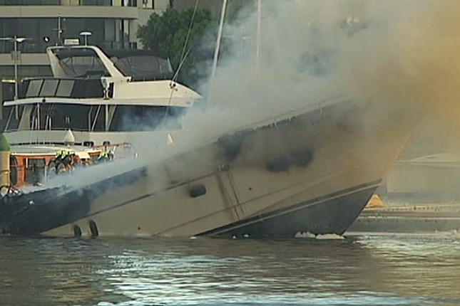 Luxury yacht sinks at Docklands after a huge inferno.
