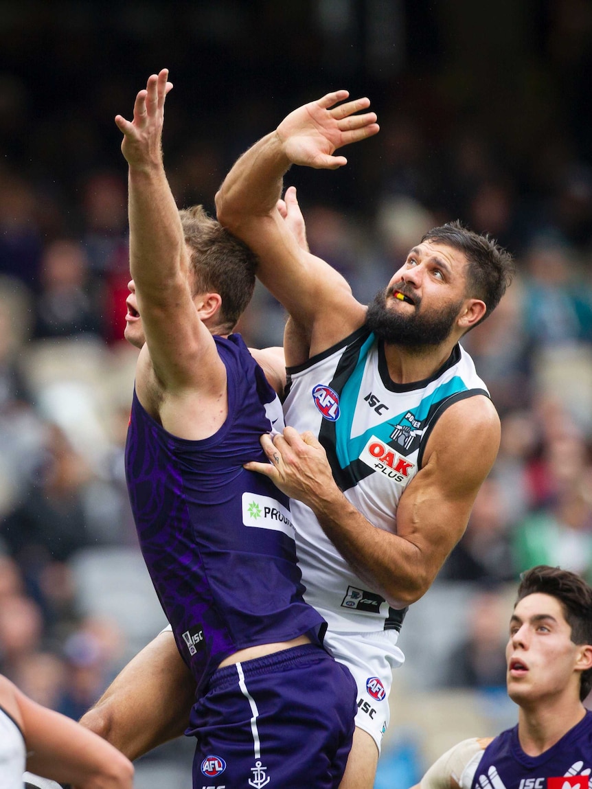 Paddy Ryder contests the ball for Port Adelaide against Fremantle.