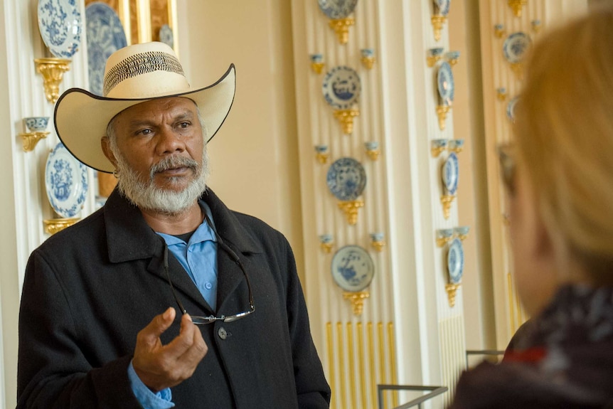 Yawuru cultural leader Neil McKenzie talking to German academic about the planned return