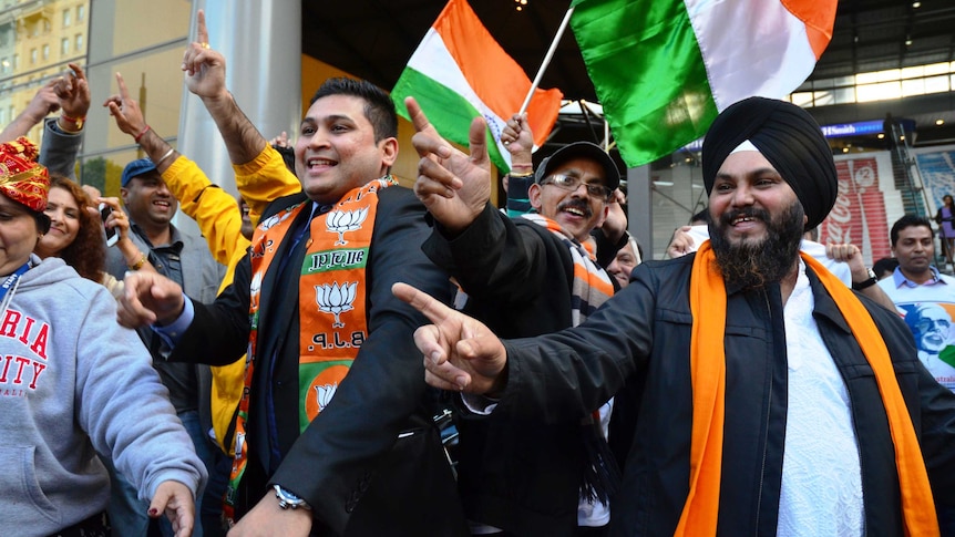 An excited crowd waits for the Modi Express, November 16, 2014