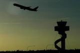 Passenger plane and air traffic control tower at Sydney airport - good generic