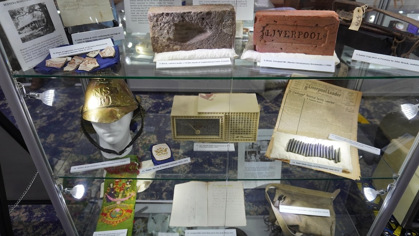 An image of historical items on the shelf.