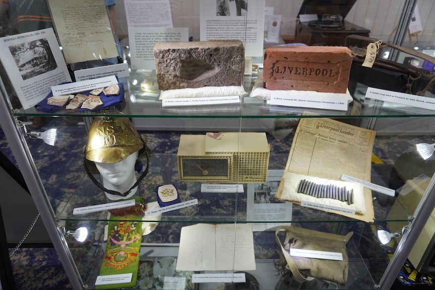 An image of historical items on the shelf.
