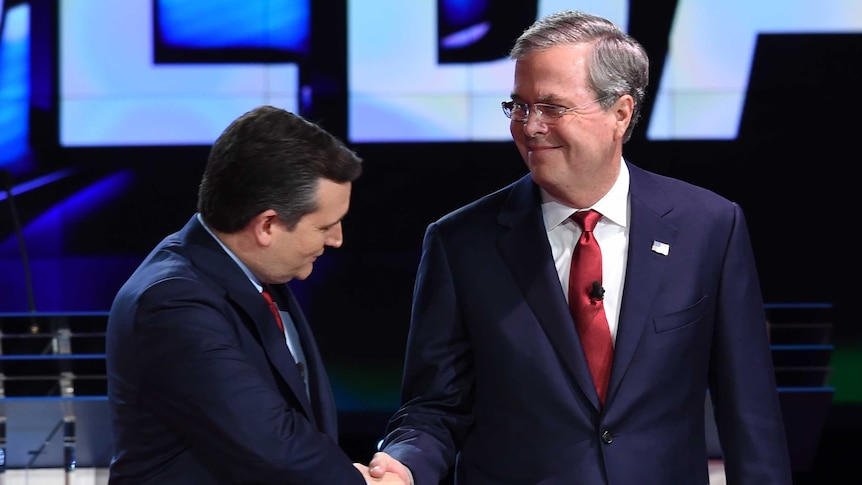 Ted Cruz shakes hands with Jeb Bush ahead of a Republican debate.