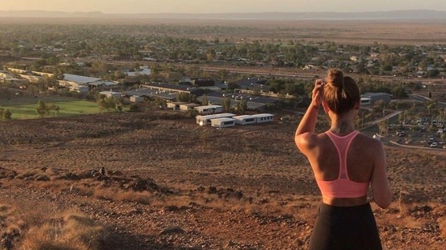 Woman on hill in outback Western Australia