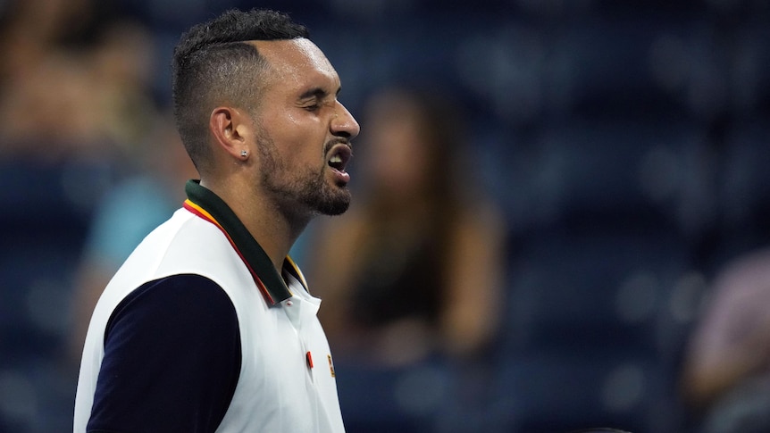 An Australian male tennis player grimaces between points during his US Open first-round match.