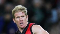 Jason Johnson fires up after kicking a goal for the Bombers