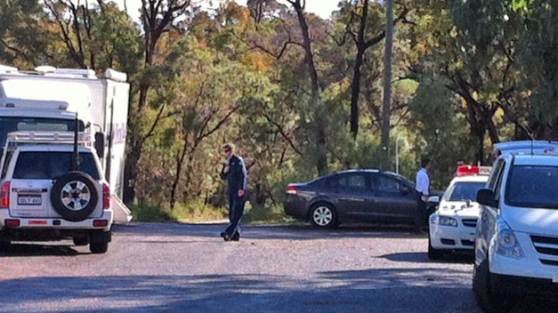 Forensic police at the Bullsbrook property in Perth where a woman was allegedly murdered, 2 August 2012
