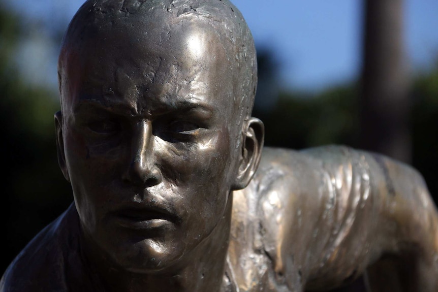 Statue of rugby league great Darren Lockyer outside Lang Park