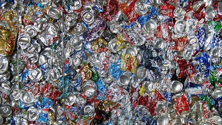 Crushed drink cans at a recycling depot.