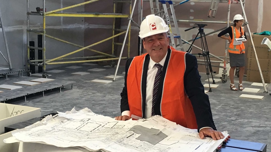 Member for Wagga Wagga, Daryl Maguire, looking at plans for the new Wagga Courthouse complex.
