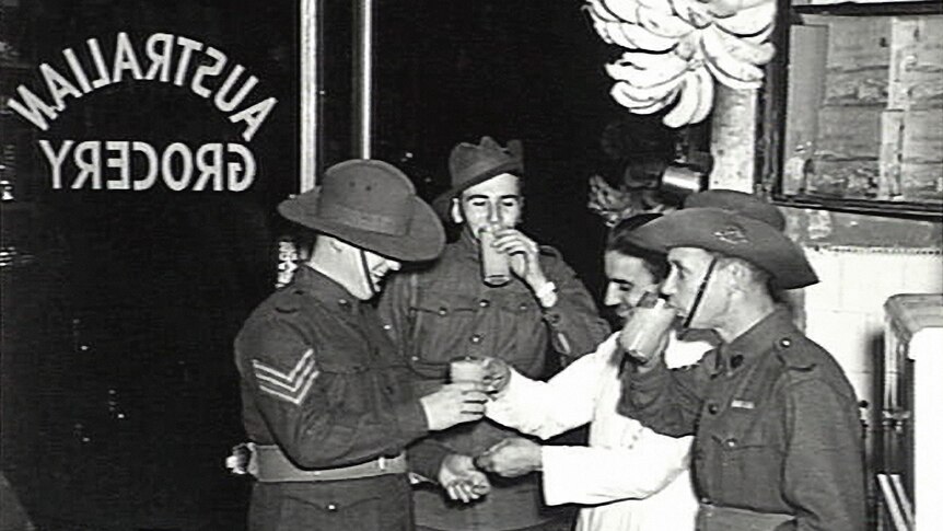 Australian soldiers sample the goods at the Australian Grocery store in Jerusalem.