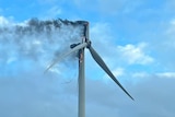 A wind turbine on fire