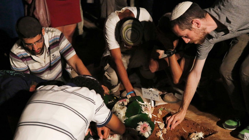 Israel youths mourn at burial of abducted teen