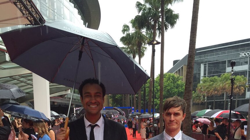 Triple j hosts Matt and Alex brave the rain to walk down the ARIA Awards red carpet.